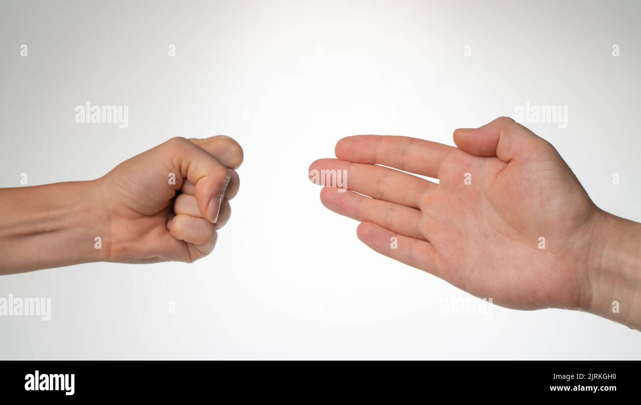Hands close-up gesture from the game rock paper scissors. High quality photo Stock Photo