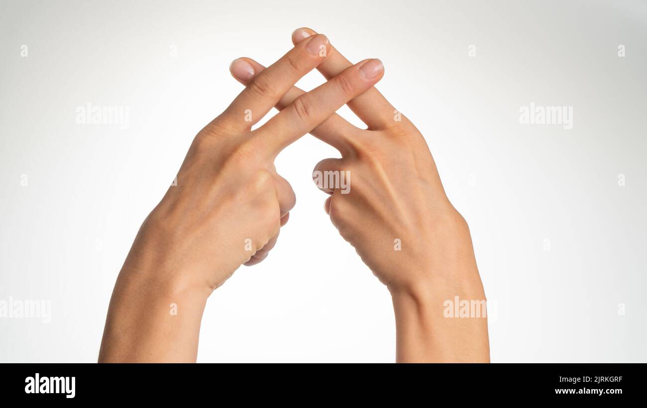 women's hand gesture of fingers grille. High quality photo Stock Photo
