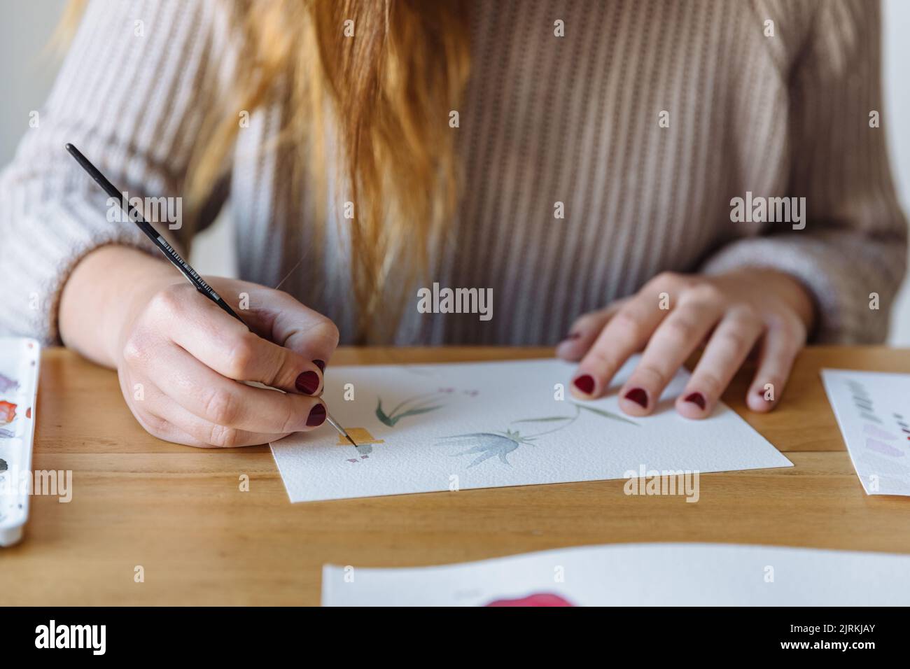 Detail of young woman painting with watercolors Stock Photo - Alamy