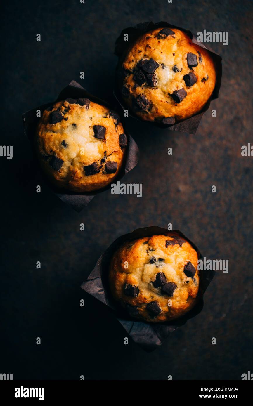 Chocolate muffins on dark background Stock Photo