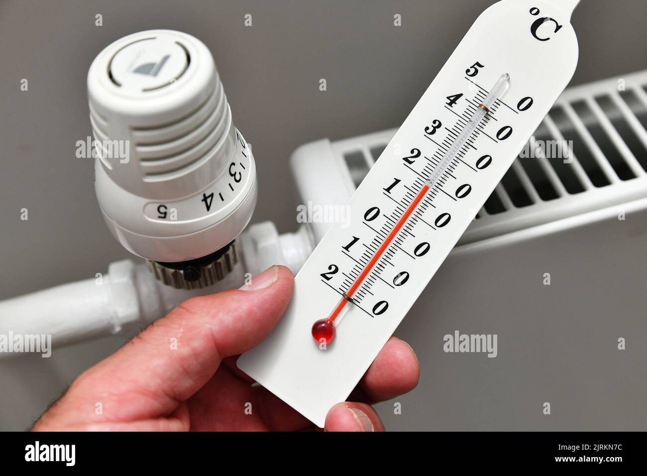 Illustration photo a thermostat on a modern heating system in an
