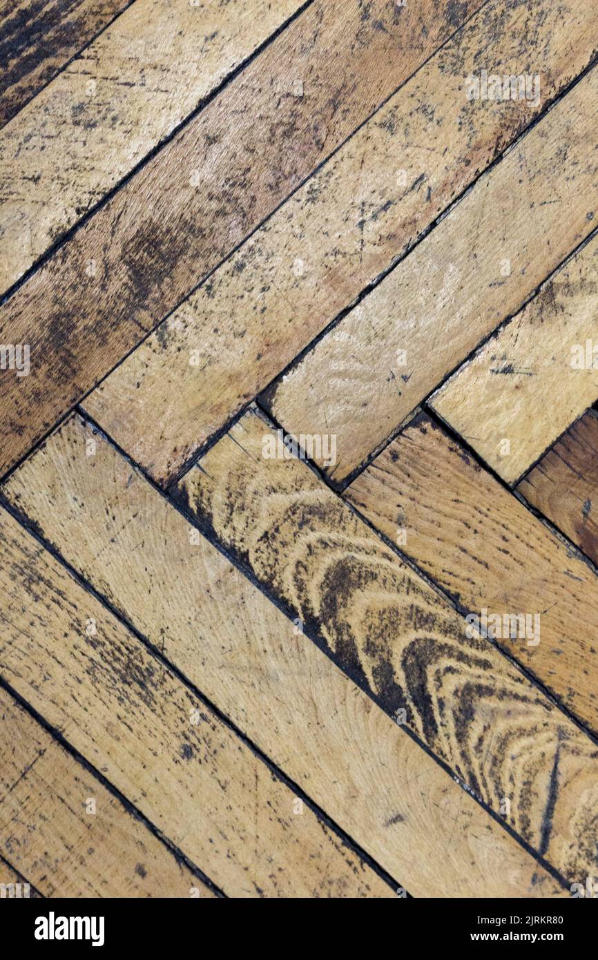 Parquet flooring. wooden floor background herringbone parquet