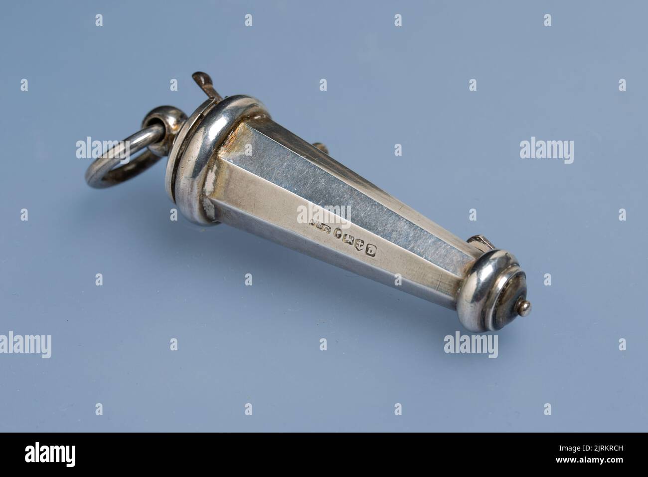 Silver cross-belt whistle as issued to military officiers, fire officers, etc., made of silver and hallmarked Jennens and Co.,1852, Victorian, ninetee Stock Photo