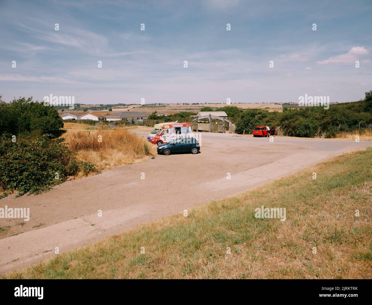 Smallgains car park with ice cream vans in the summer landscape of