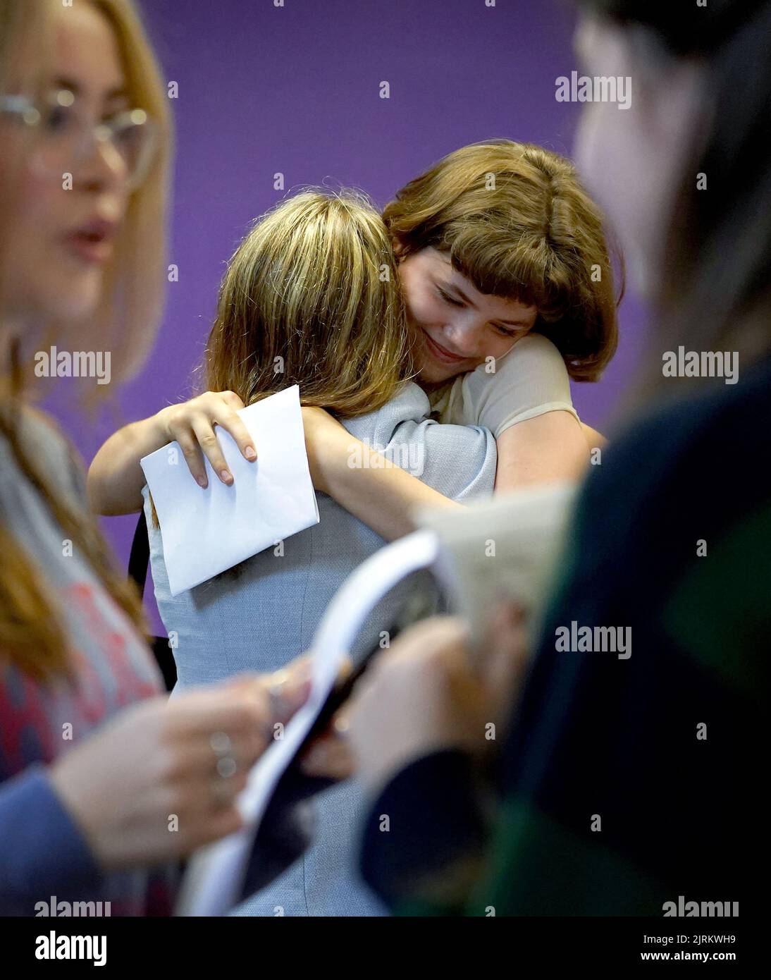 Students congratulate each other receiving their GCSE results at ...