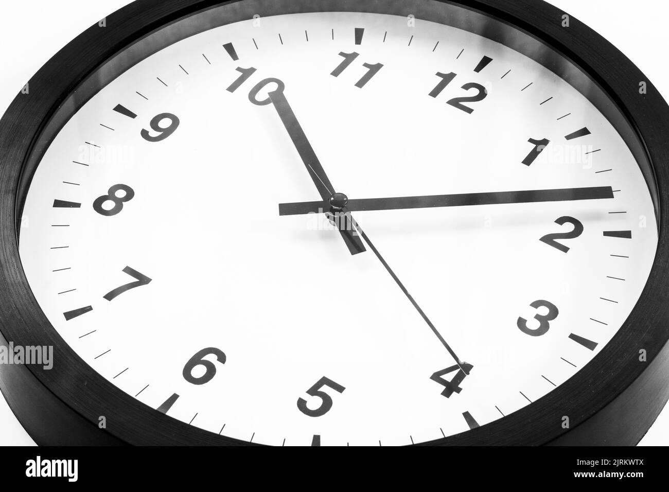 Office wall clock. Black and white clock time to work concept Stock