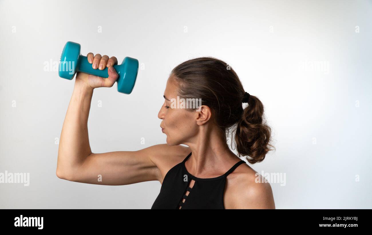 Sports woman dumbbells in hands hi-res stock photography and images - Page  2 - Alamy