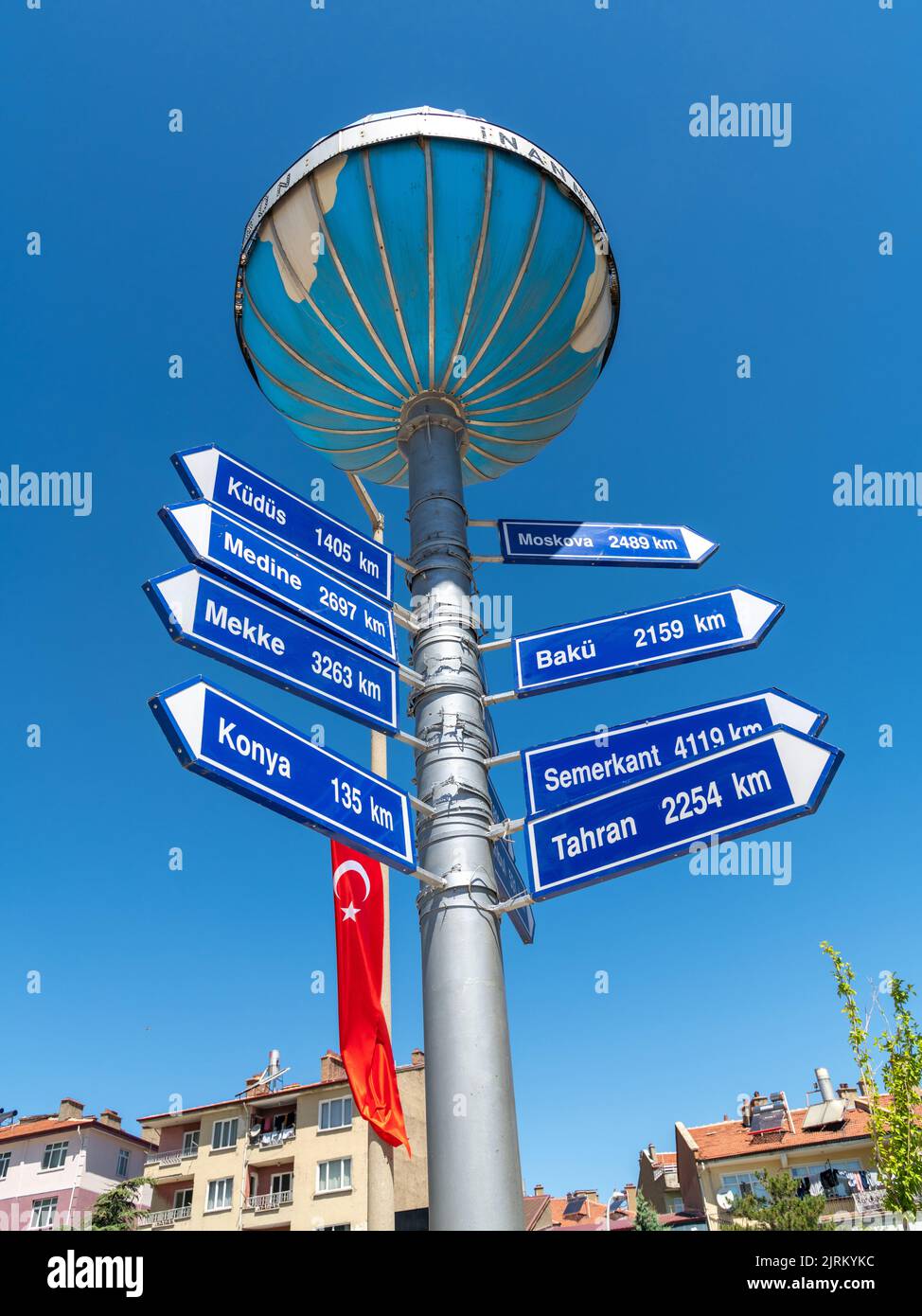 Aksehir, Turkey - July 04, 2022: Aksehir Nasreddin Hoca Square, the Infidel Measures Monument and the distance sign to different cities on it Stock Photo