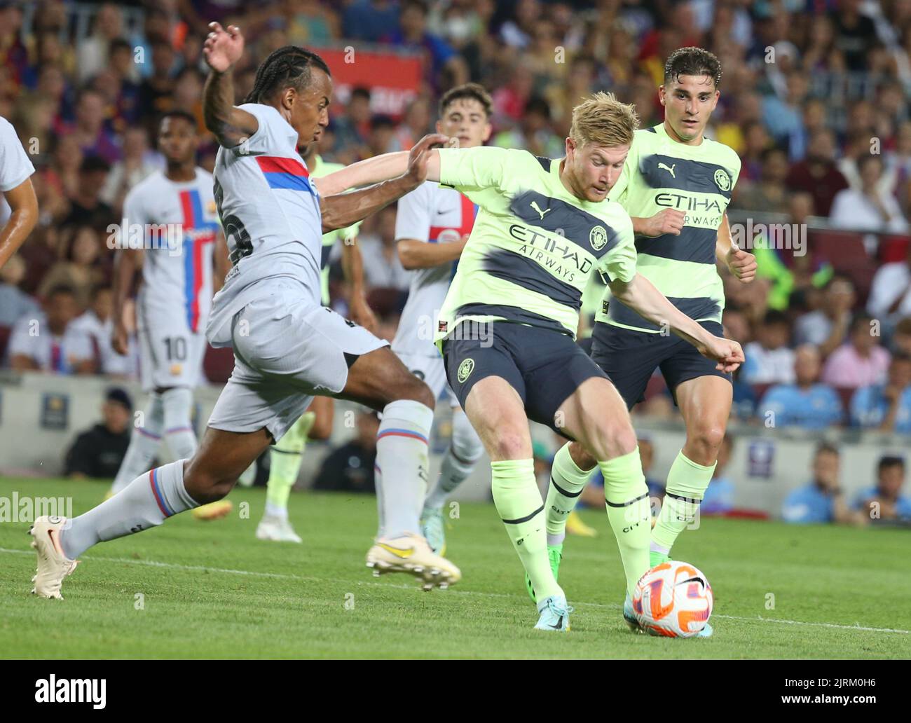 Jules Kounde of FC Barcelona and Kevin De Bruyne of Manchester City during the Friendly Football match between FC Barcelona and Manchester City on August 24, 2022 at Camp Nou stadium in Barcelona, Spain - Photo Laurent Lairys / DPPI Stock Photo