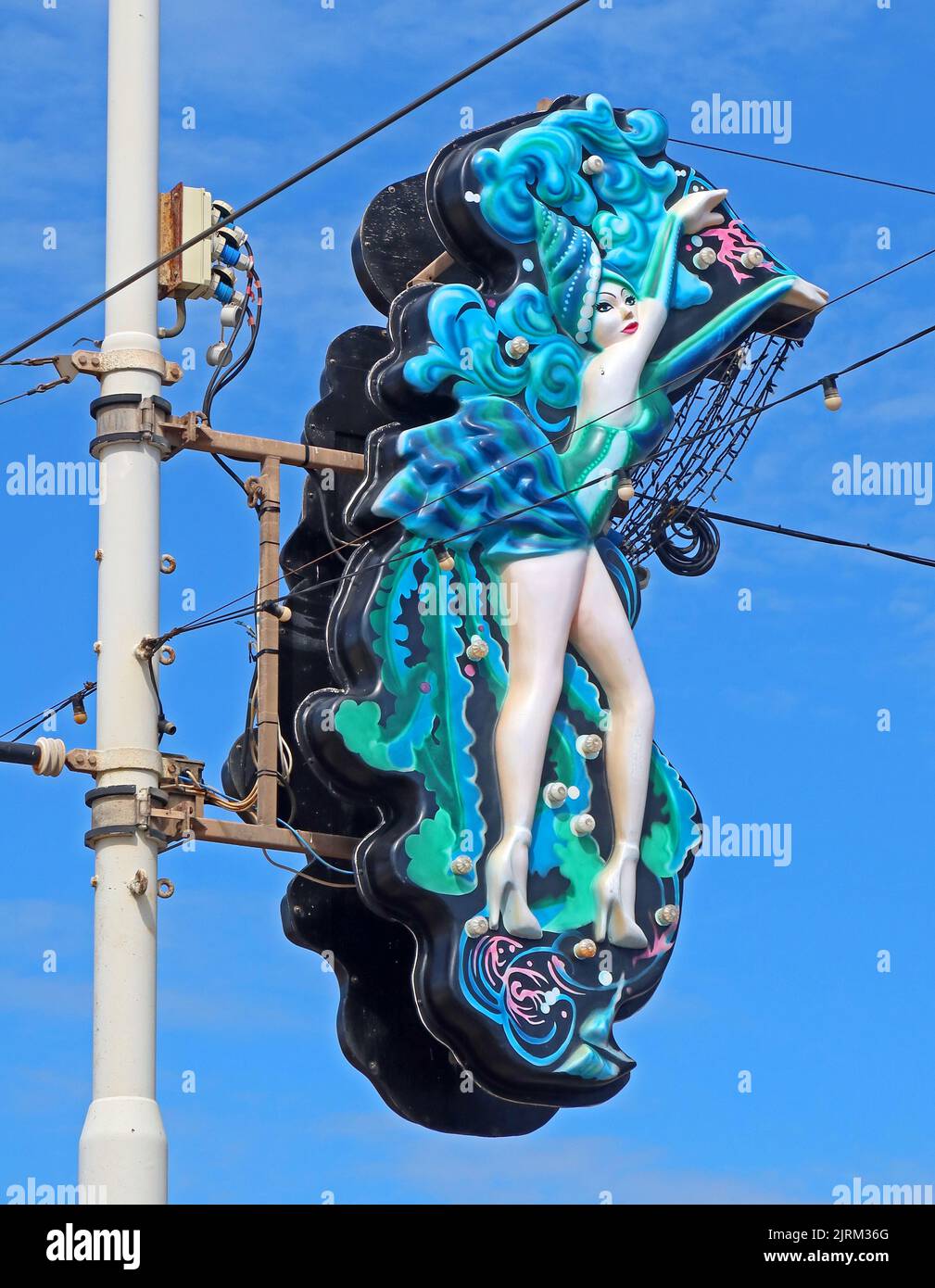 Burlesque illumination - dancing show girl - on a lamp post, promenade, Blackpool, Lancs, England, UK, FY1 Stock Photo