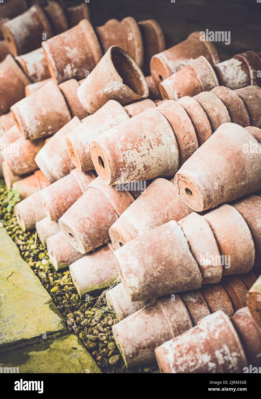 A pile of terracotta flower pots at Eythrope Gardens on the Waddesdon Manor estate. Stock Photo