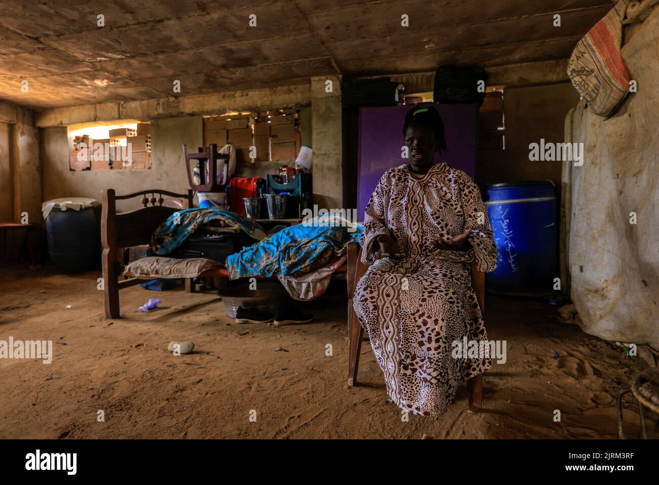 South Sudanese Alissa Deng, who returned to Khartoum after the 2011 secession, looks on during an interview with Reuters at a makeshift shelter in an abandoned plot of land, in Bahri, Sudan, August 7, 2022. REUTERS/Mohamed Nureldin Abdallah Stock Photo