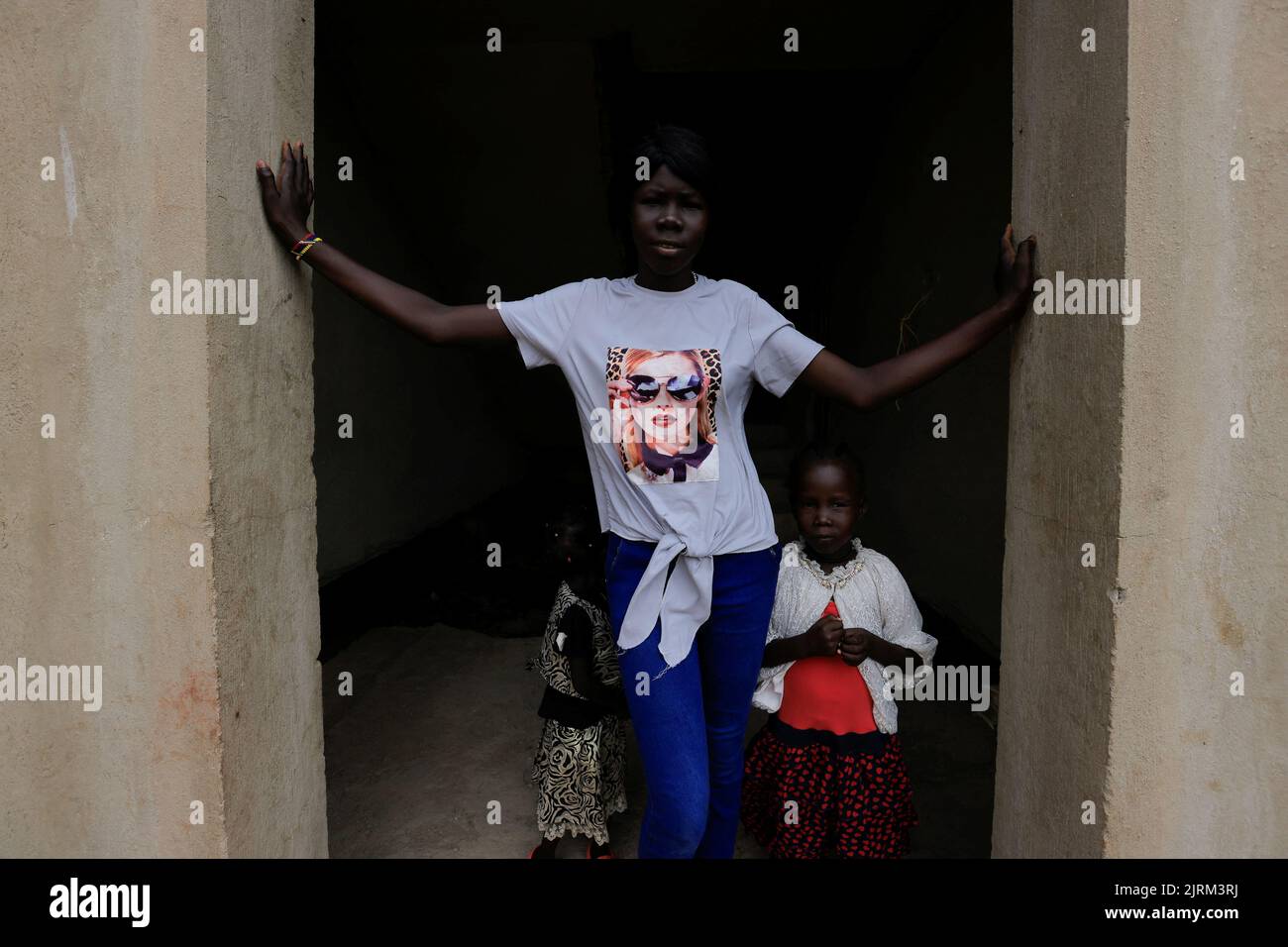South Sudanese girls who returned to Khartoum after the 2011 secession, live in a makeshift shelter in an abandoned plot of land look on in Bahri, Sudan, August 07, 2022. REUTERS/Mohamed Nureldin Abdallah Stock Photo