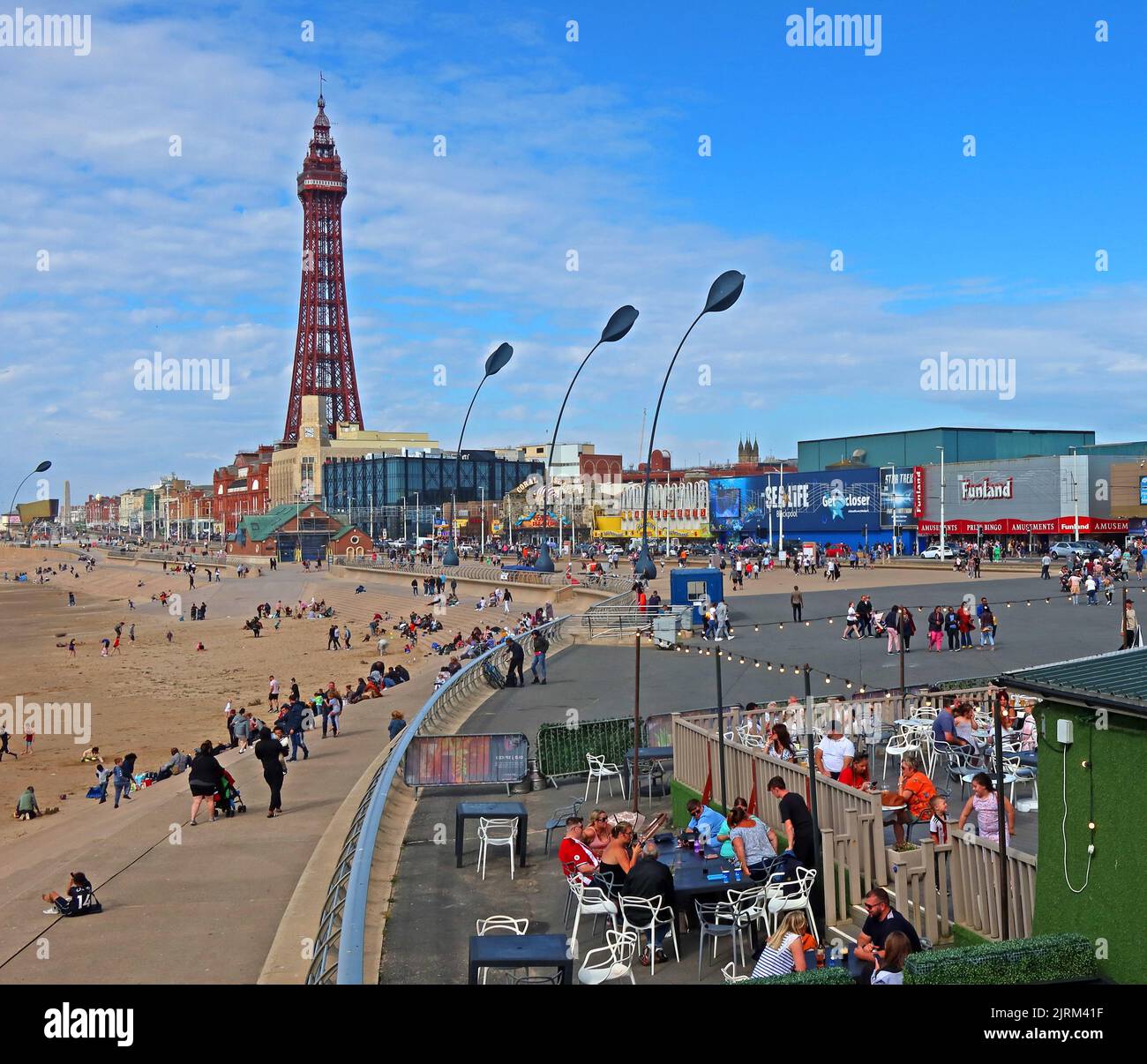 Blackpool Tower, promenade and beach, Lancashire seaside resort, North West England, UK, FY1 4BJ. Stock Photo