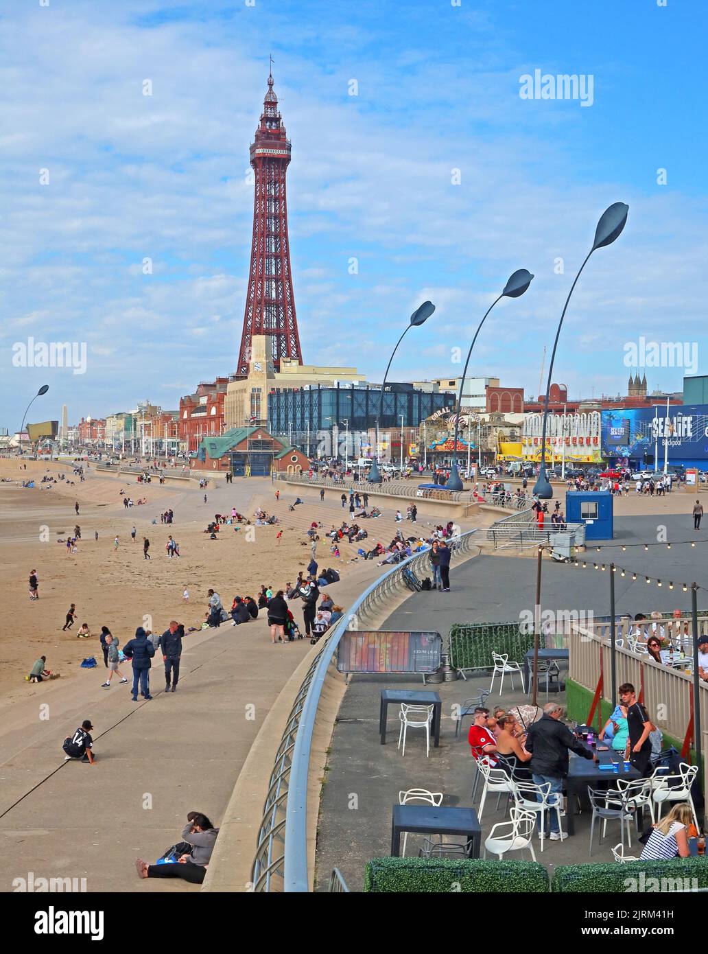 Blackpool Tower, promenade and beach, Lancashire seaside resort, North West England, UK, FY1 4BJ. Stock Photo