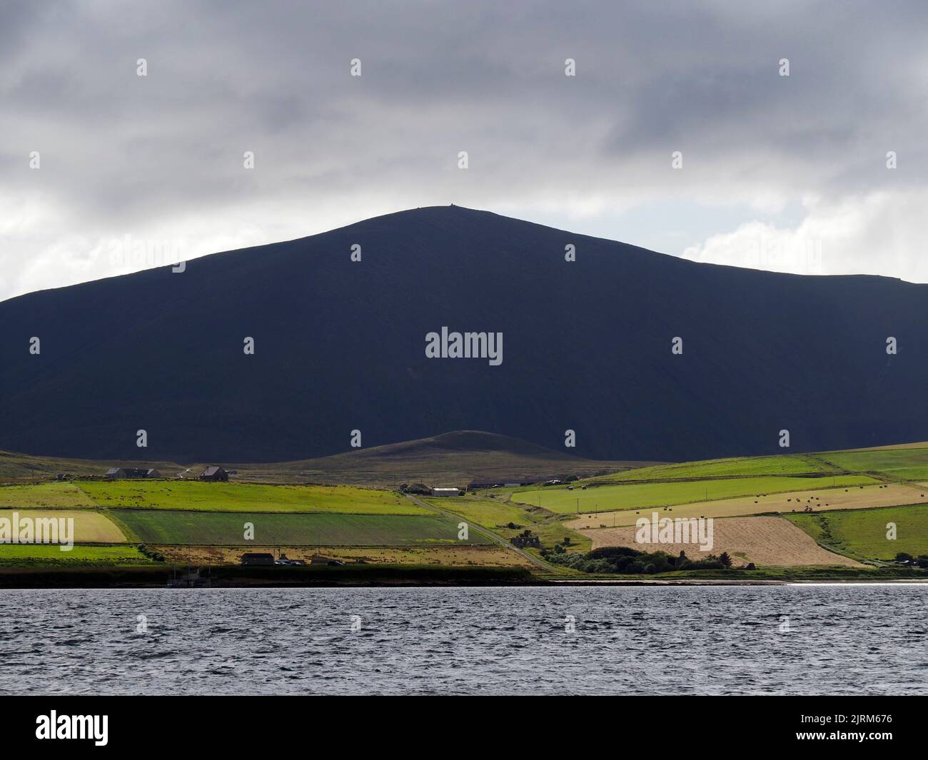 Ward Hill, Hoy, from Burra Sound, Orkney Stock Photo
