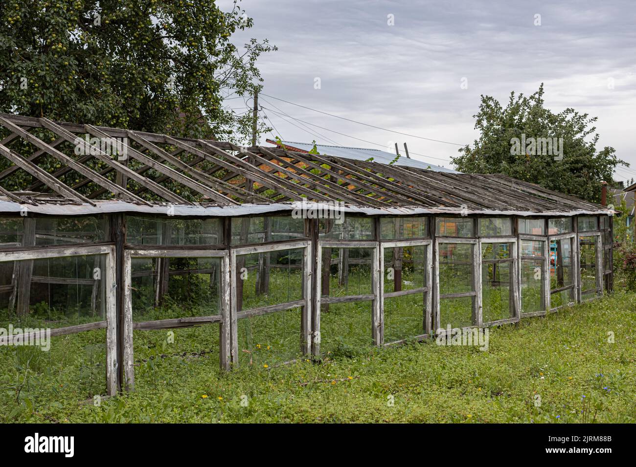 Abandoned greenhouse stands hi-res stock photography and images - Alamy