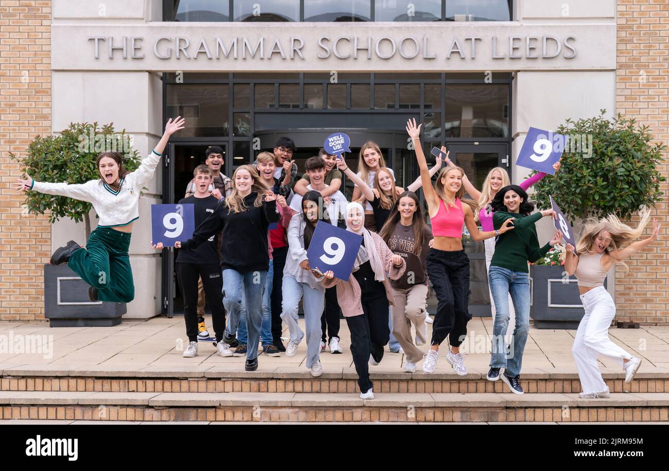 Students celebrate after receiving their GCSE results at The Grammar