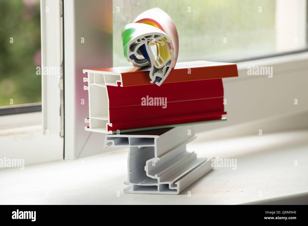 samples of the window frame lie on the window sill on the window in the ...