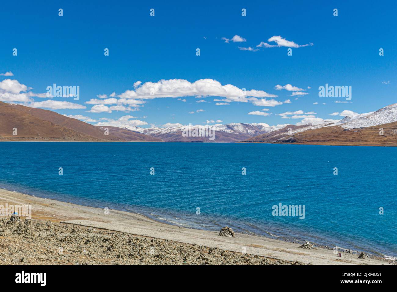 Yangzhuo Yongcuo lake also known as slender west lake is close to Lhasa, Tibet, China - image taken on the Tibetan Friendship Highway. Stock Photo