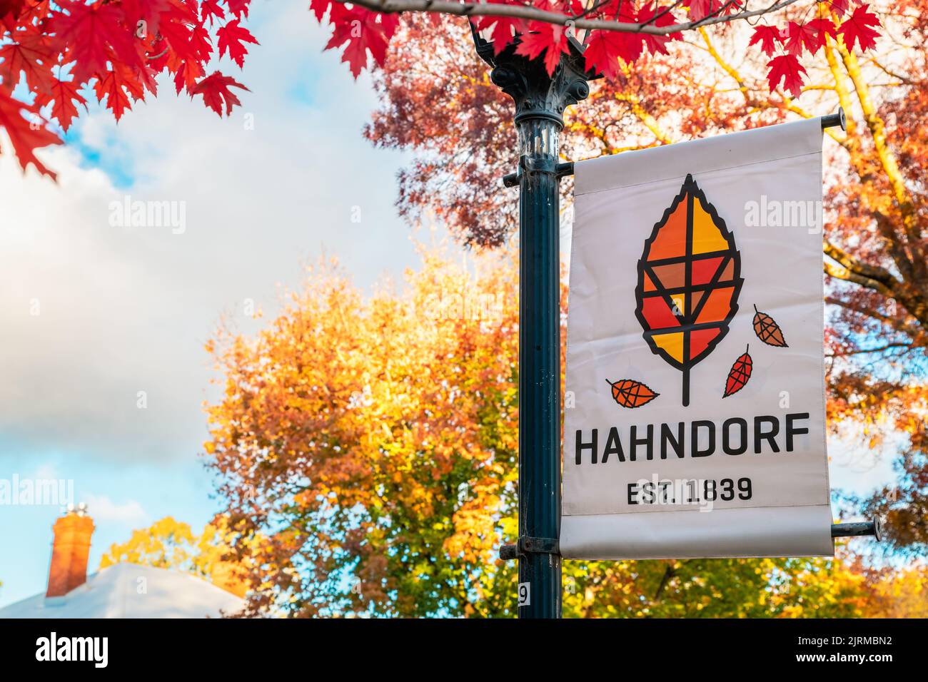 Adelaide Hills, South Australia - April 24, 2021: Hahndorf German village banner with logo on the Main street on a day during autumn season Stock Photo