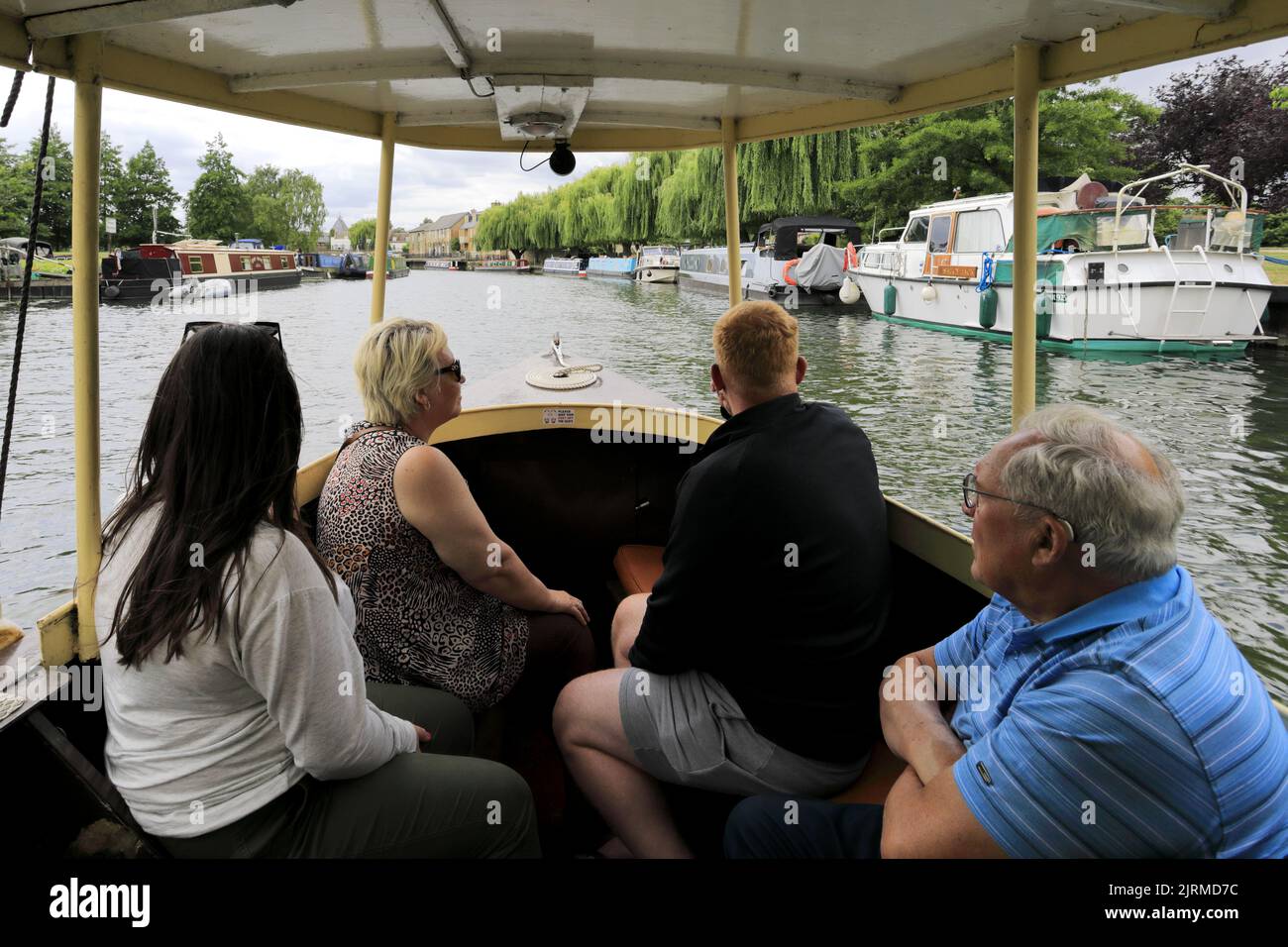 The Liberty Belle tourist boat on the river Great Ouse embankment, Ely City, Cambridgeshire