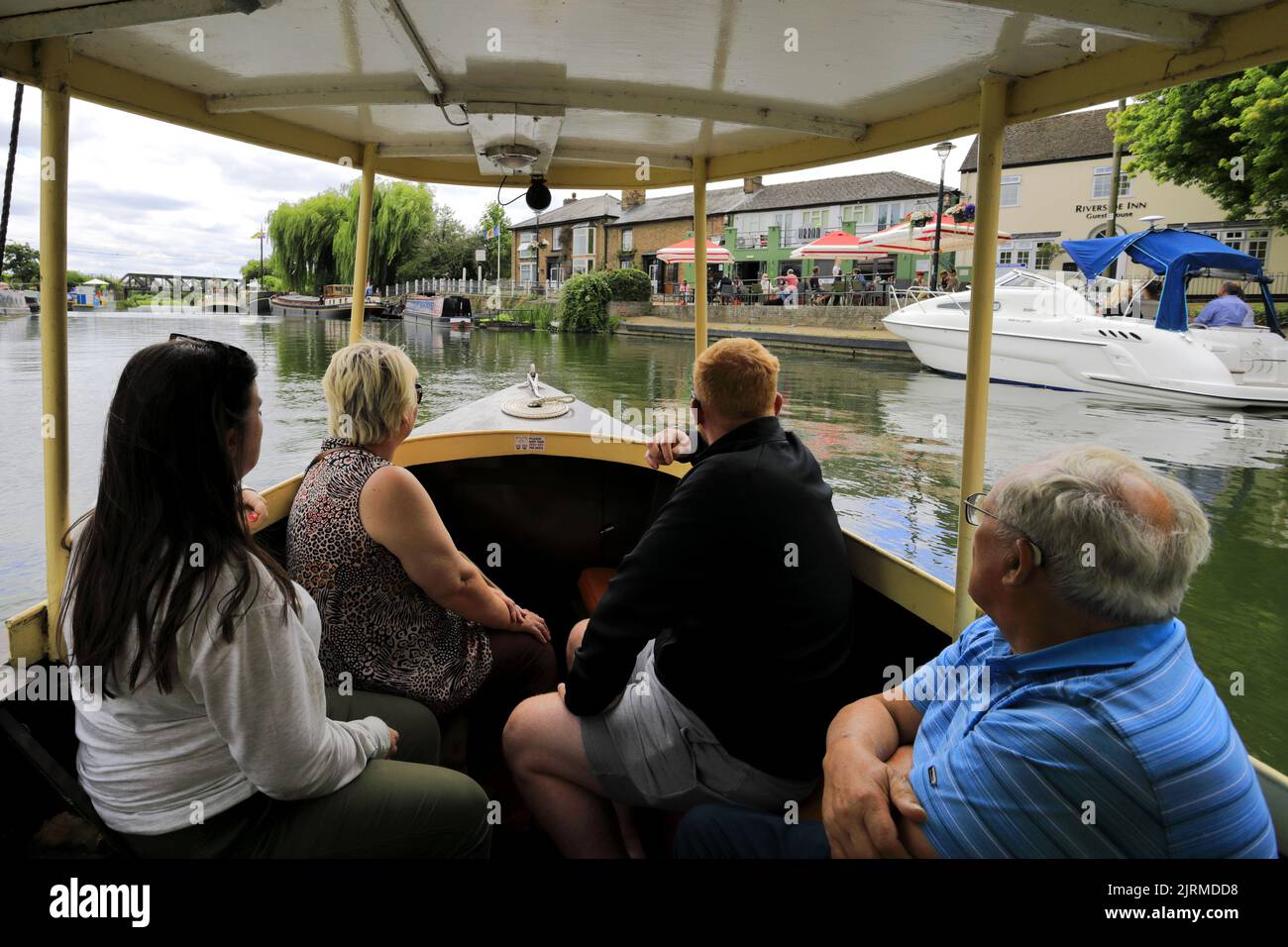 The Liberty Belle tourist boat on the river Great Ouse embankment, Ely