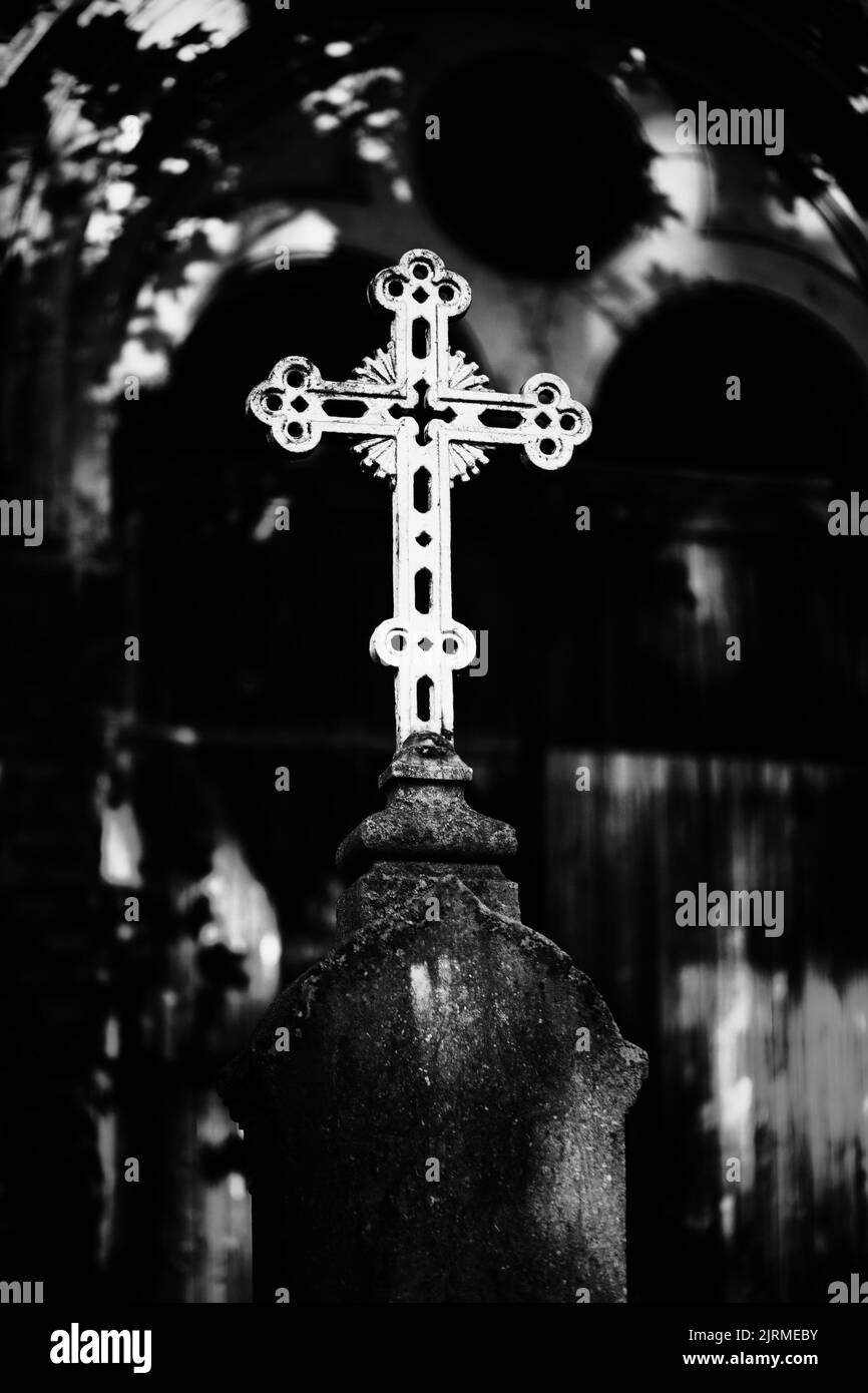 Metal cross on grave Black and White Stock Photos & Images - Alamy