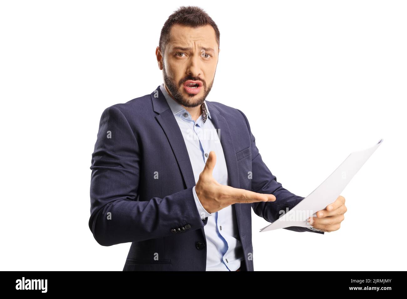 Angry man holding a paper document and looking at camera isolated on white background Stock Photo