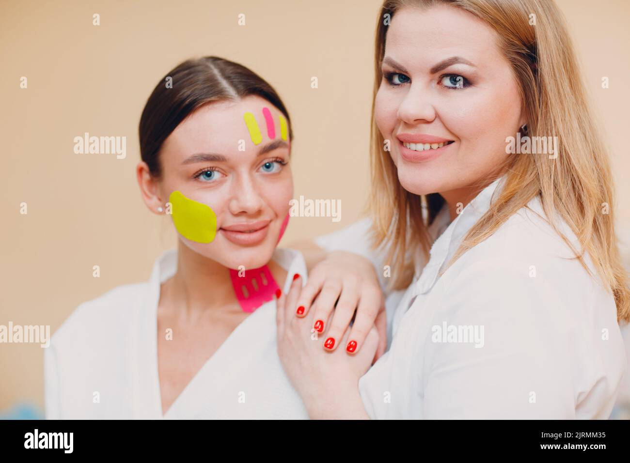 Beautiful woman applying tape lifting treatment procedure on face Stock Photo Alamy