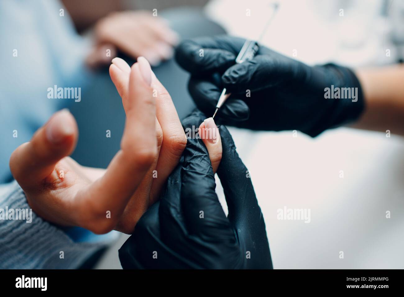 Manicure process female hands finger nails polish Stock Photo Alamy