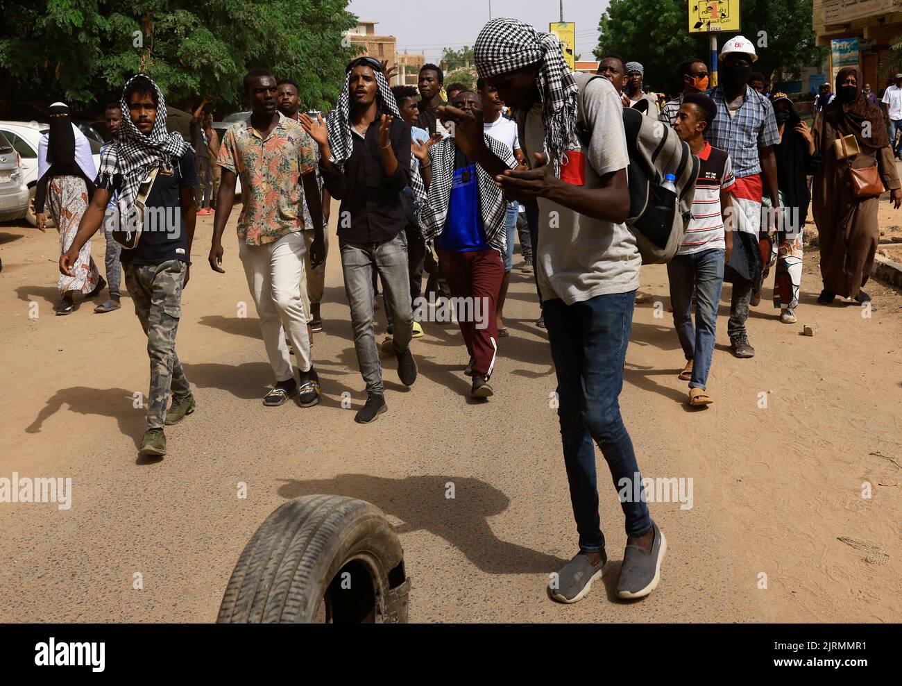 Protesters march through the capital Khartoum during a rally against military rule following the last coup, in Khartoum, Sudan August 25, 2022. REUTERS/Mohamed Nureldin Abdallah Stock Photo