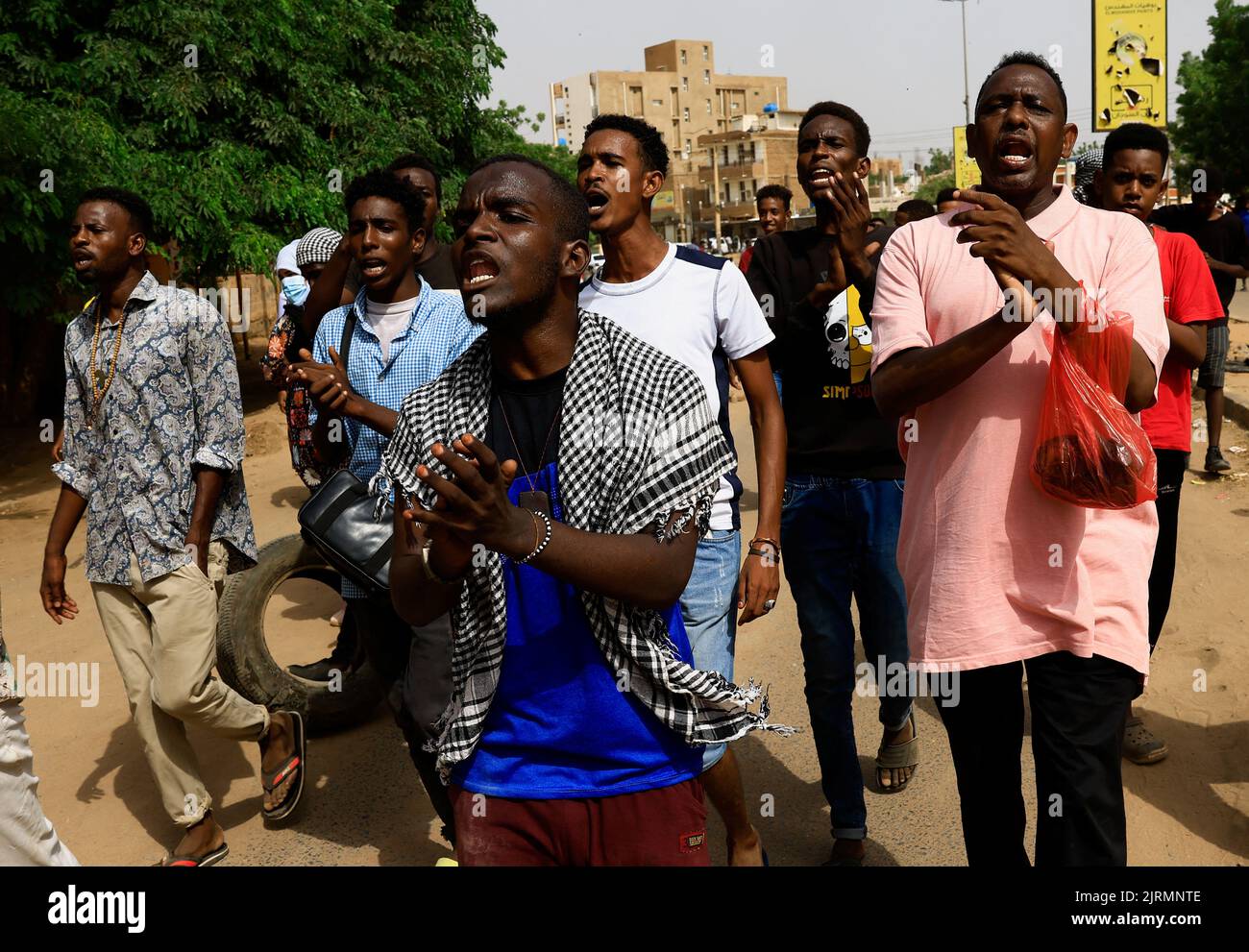 Protesters march through the capital Khartoum during a rally against military rule following the last coup, in Khartoum, Sudan August 25, 2022. REUTERS/Mohamed Nureldin Abdallah Stock Photo