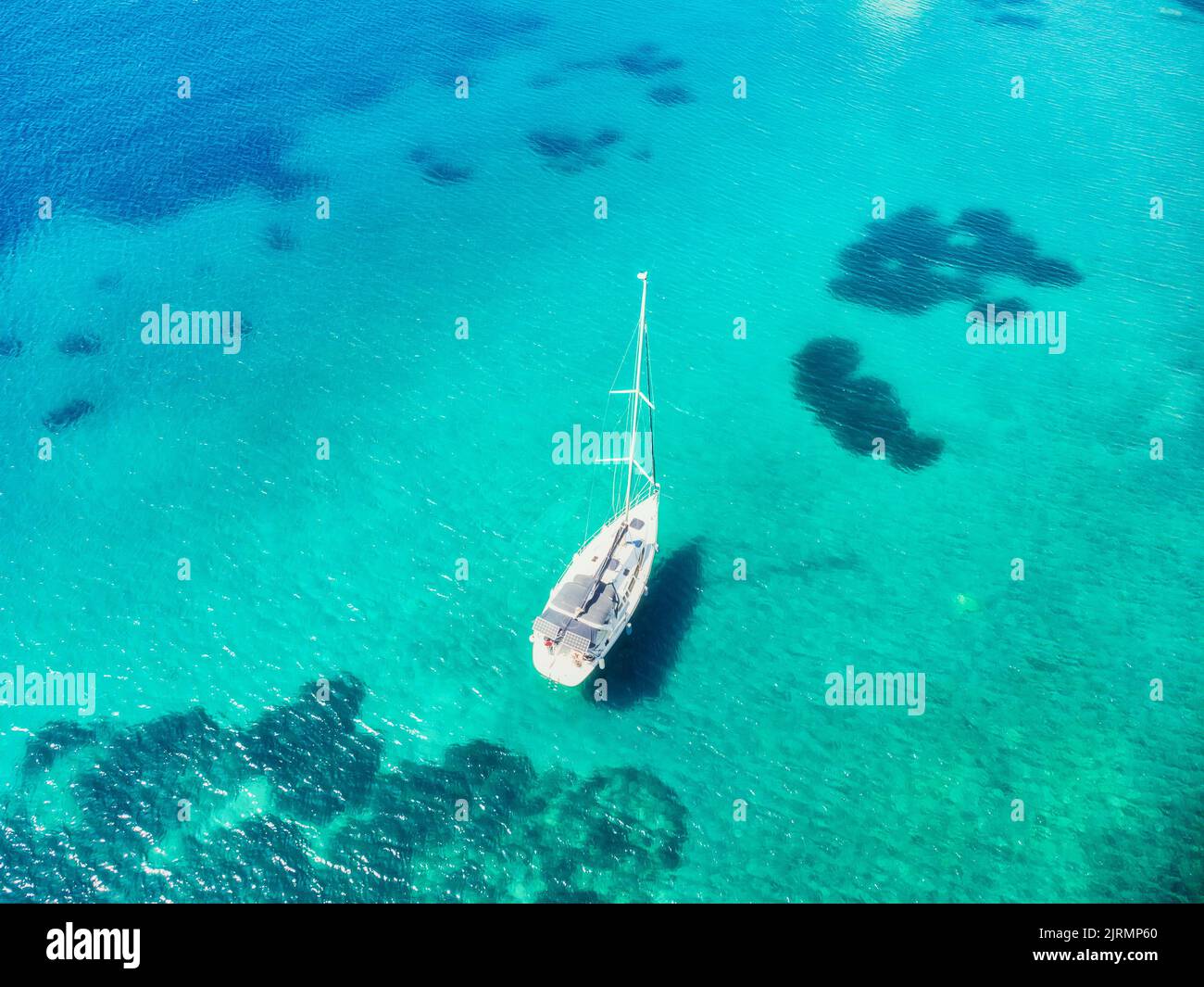 Aerial view of beautiful yachts and boats on the sea at sunset in ...