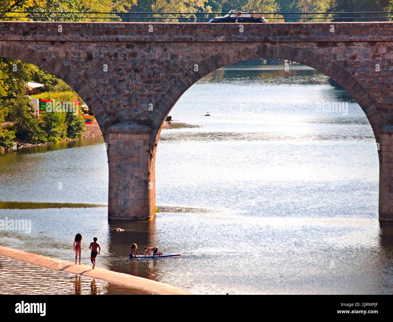 The bridge over the River Orb, by the village of Roquebrun in southern France Stock Photo