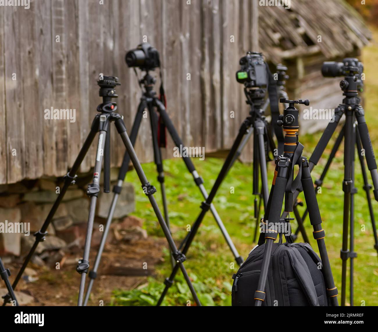 A lot of tripods without cameras are waiting for the shooting Stock ...