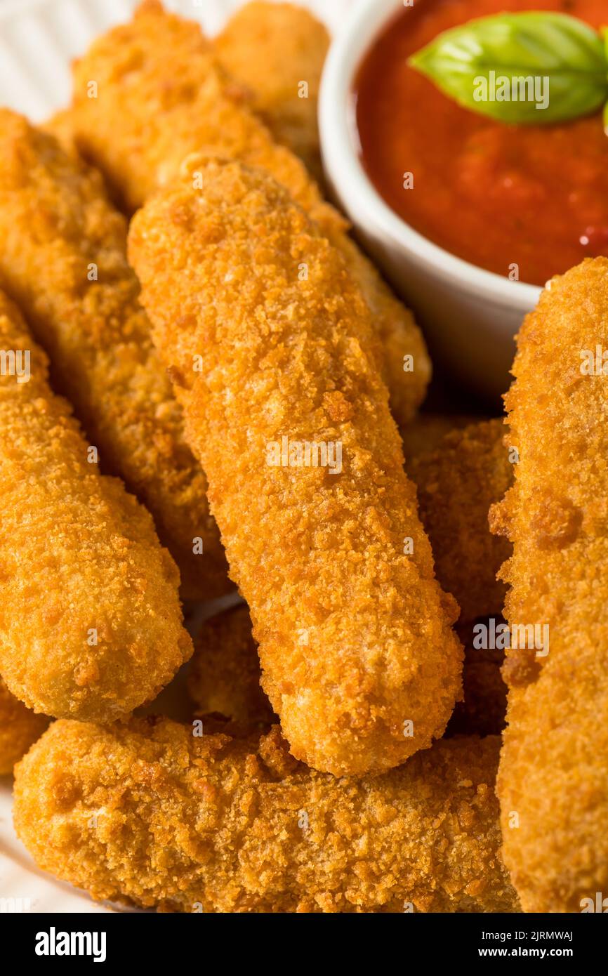Homemade Deep Fried Mozzarella Sticks with Marinara Sauce Stock Photo
