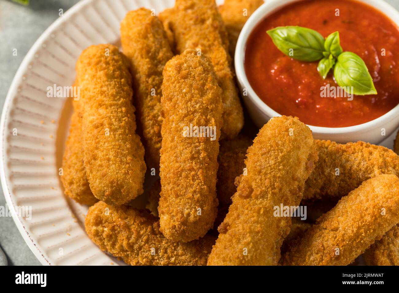Homemade Deep Fried Mozzarella Sticks with Marinara Sauce Stock Photo