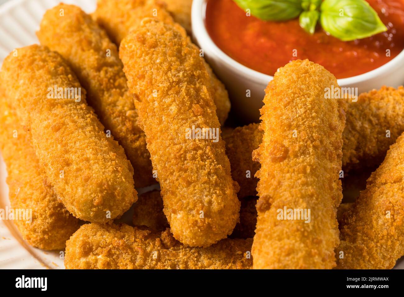 Homemade Deep Fried Mozzarella Sticks with Marinara Sauce Stock Photo