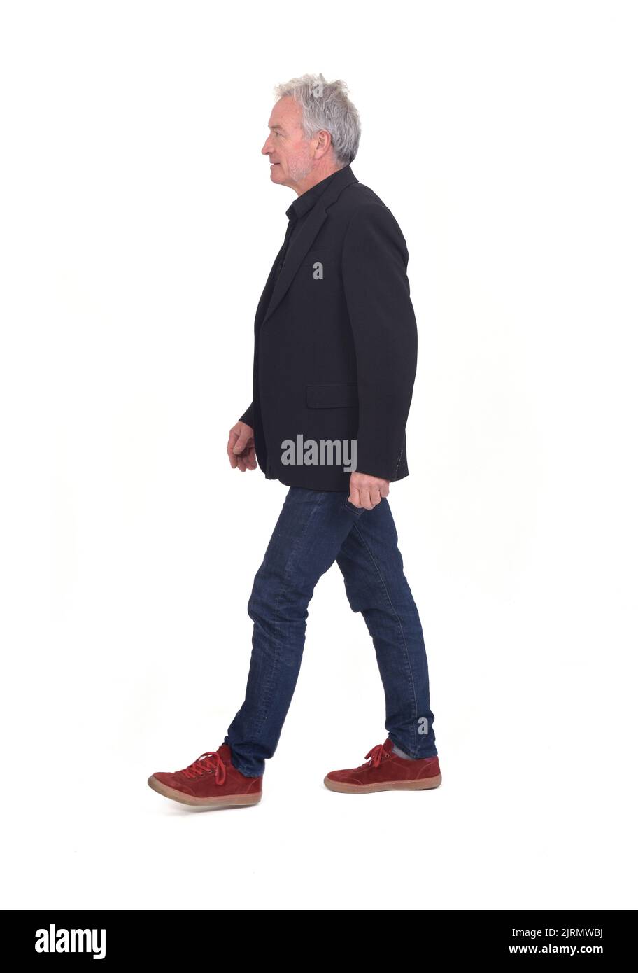 side view of senior man walking on white background Stock Photo - Alamy