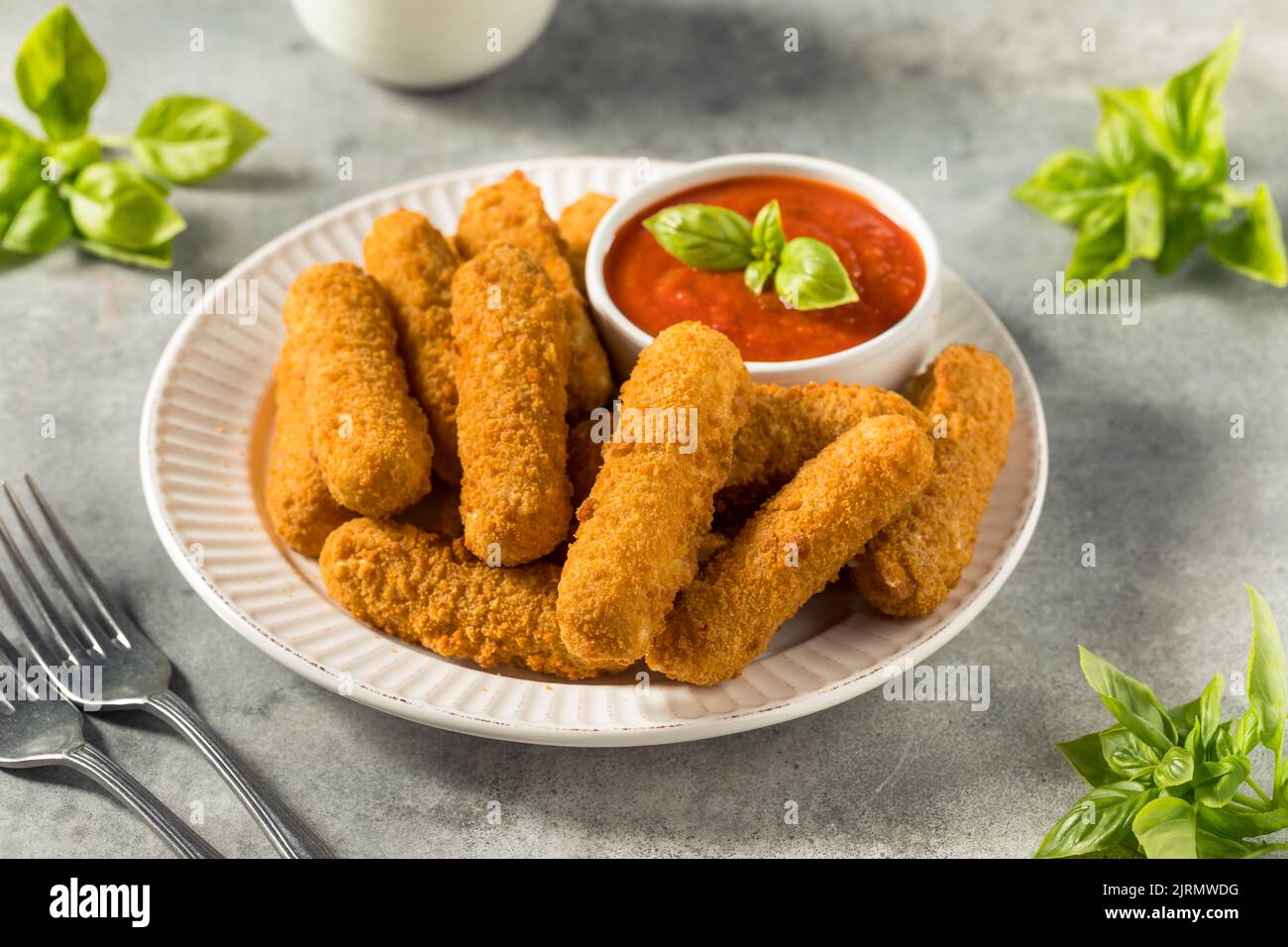Homemade Deep Fried Mozzarella Sticks with Marinara Sauce Stock Photo