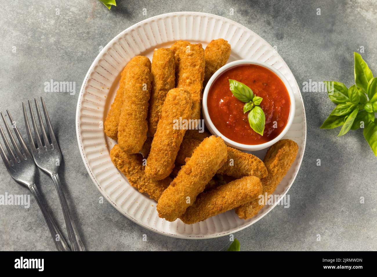 Homemade Deep Fried Mozzarella Sticks with Marinara Sauce Stock Photo