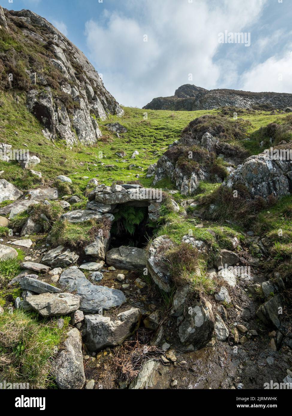 Ancient natural spring well of Tobar Challium Chille, Kiloran, Isle of Colonsay, Scotland, England, UK. Stock Photo