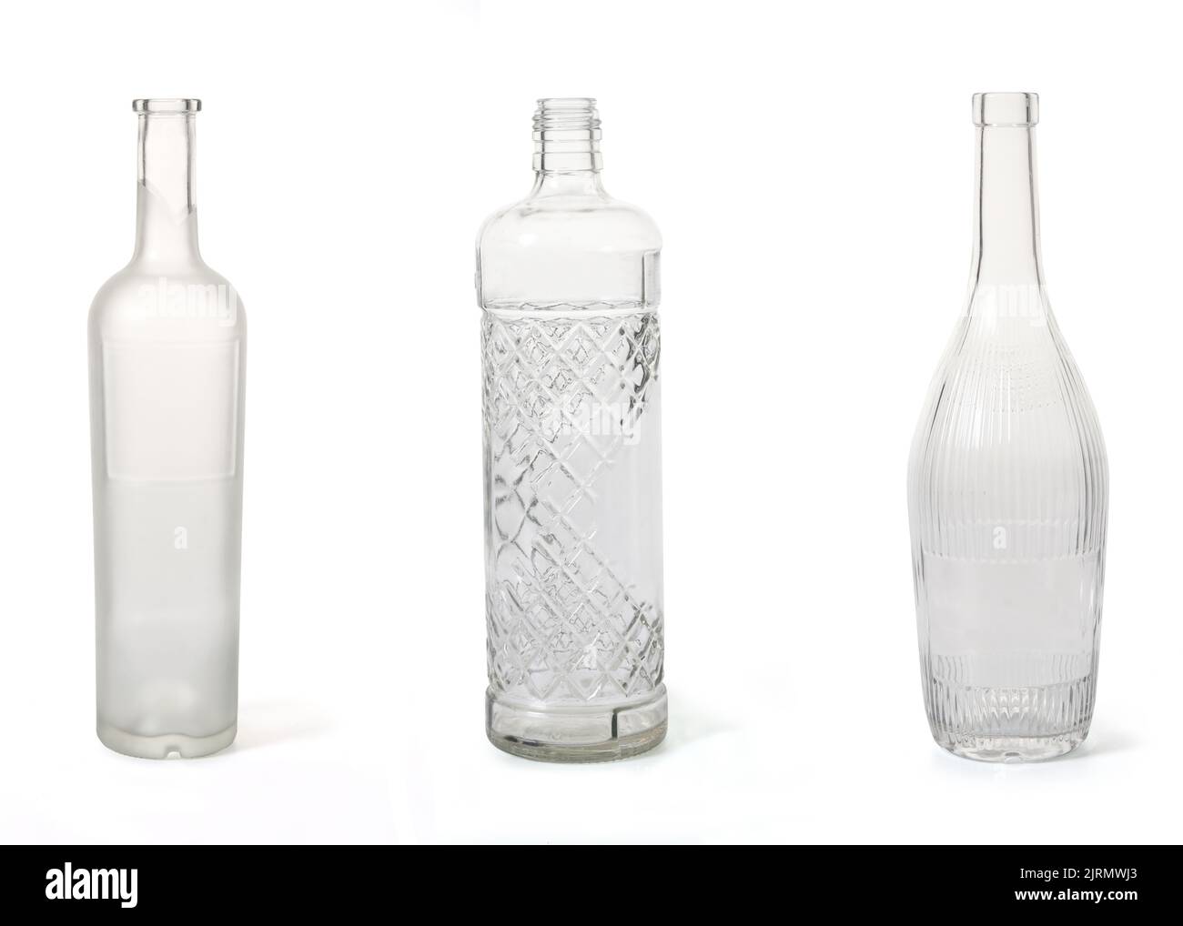 group of opaque and textured bottles on white background Stock Photo