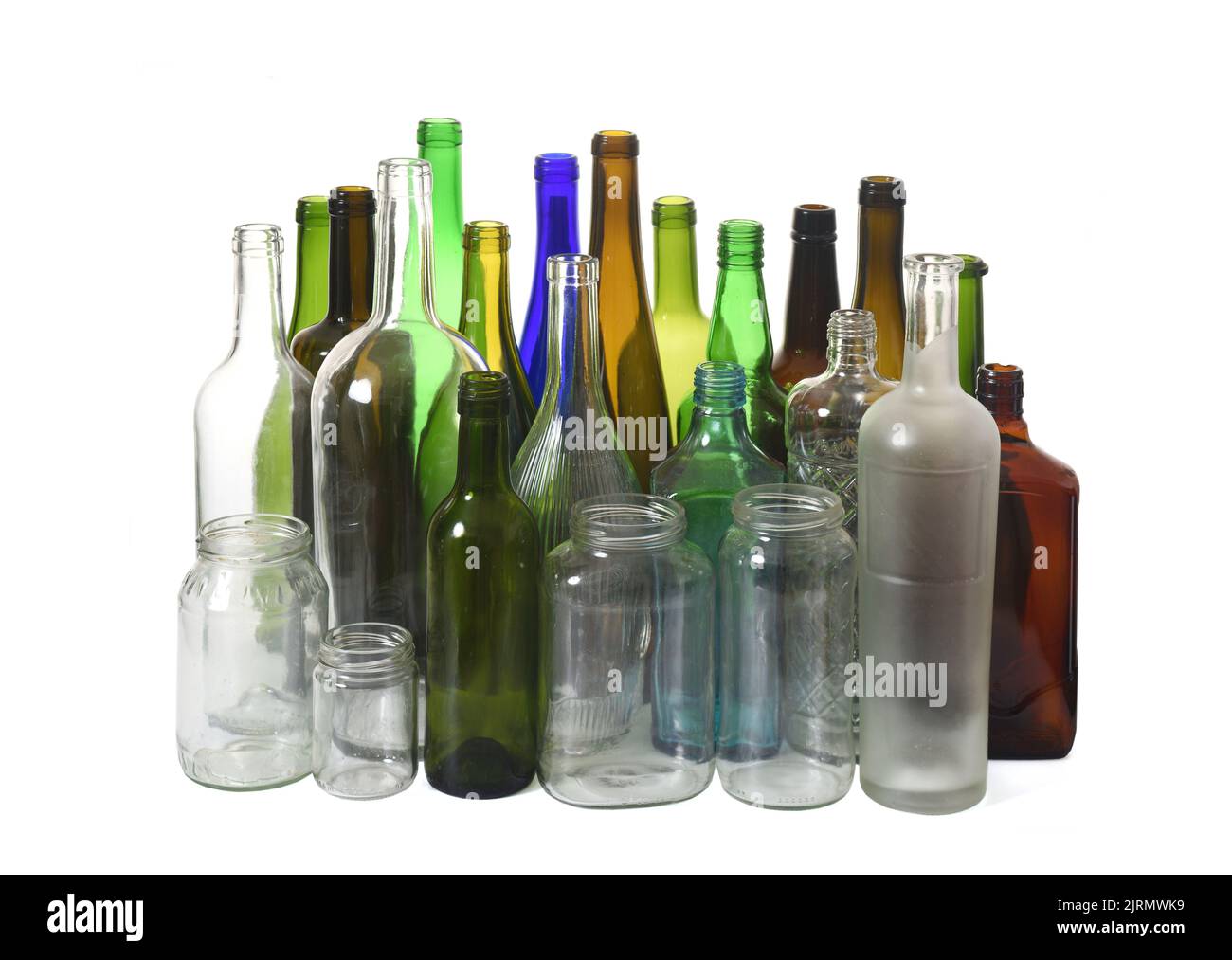 set old bottles for recycling on white background Stock Photo - Alamy