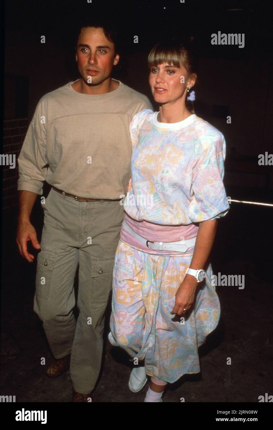 Olivia Newton-John and Matt Lattanzi at the 12th Annual Great Coldwater Canyon Chili Cook off to Benefit St. Michael's and All Angels School on May 7, 1988 at St. Michael's and All Angels School in Studio City, CaliforniaCredit: Ralph Dominguez/MediaPunch Stock Photo