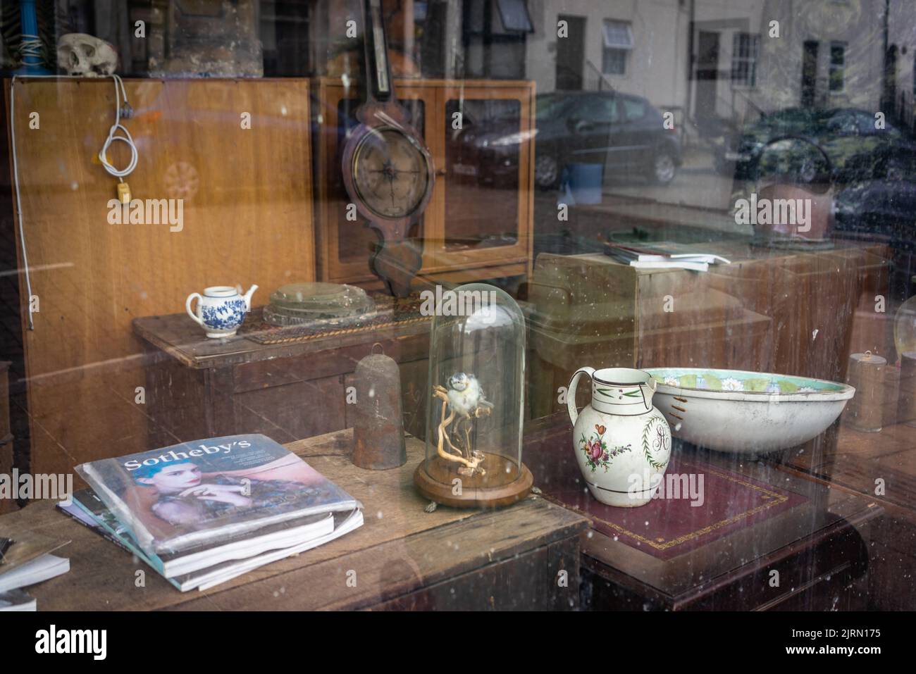 Antique shop window display in St Mary's, Southampton, Hampshire, England, UK Stock Photo