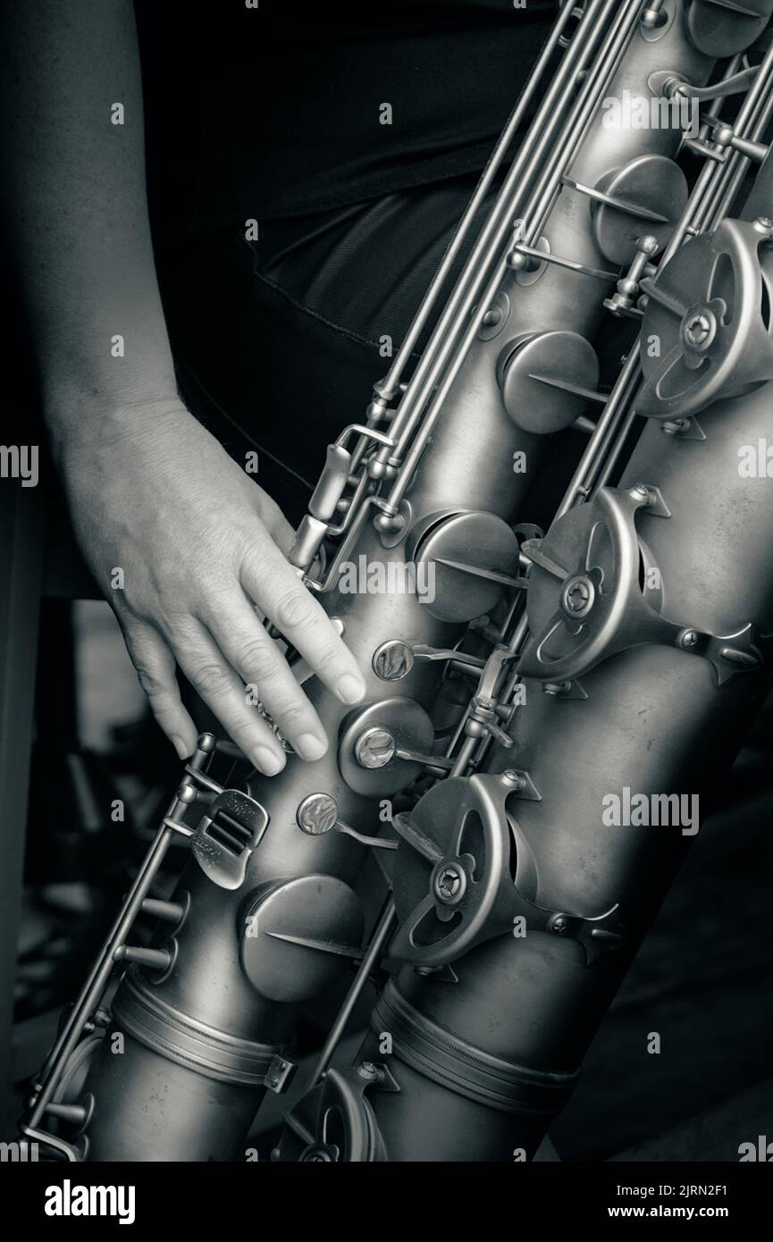 Person Playing A P.Mauriat PMB-300 DK Baritone Saxophone, UK Stock Photo