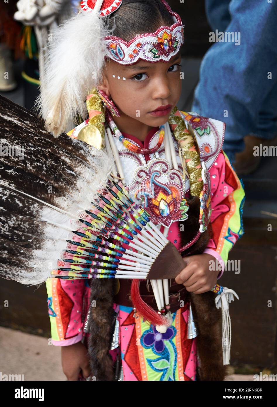 A young Native American girls prepares to compete in the Native ...