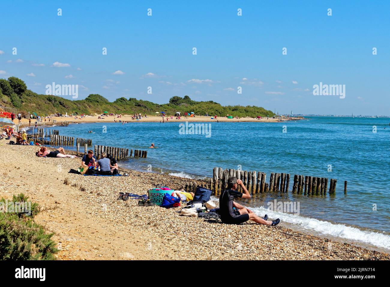 Crowds on the beach at Lepe country park on a hot and sunny summers day, Hampshire England UK Stock Photo